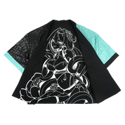 Black and turquoise kimono with white interior and exterior designs and a snake scale finish