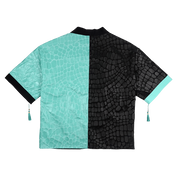 Black and turquoise kimono with white interior and exterior designs and a snake scale finish