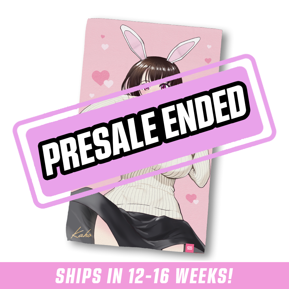 Hand towel with anime-style woman wearing bunny ears, cream ribbed sweater with bow, black skirt, and pink heart background.